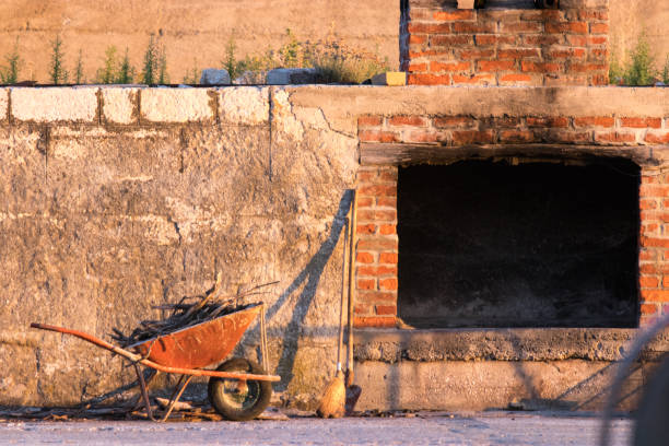 Wheelbarrow with wood and fireplace bbq