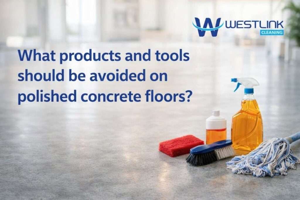 Cleaning tools and chemical bottles beside a polished concrete floor, showing which products and rough materials should not be used