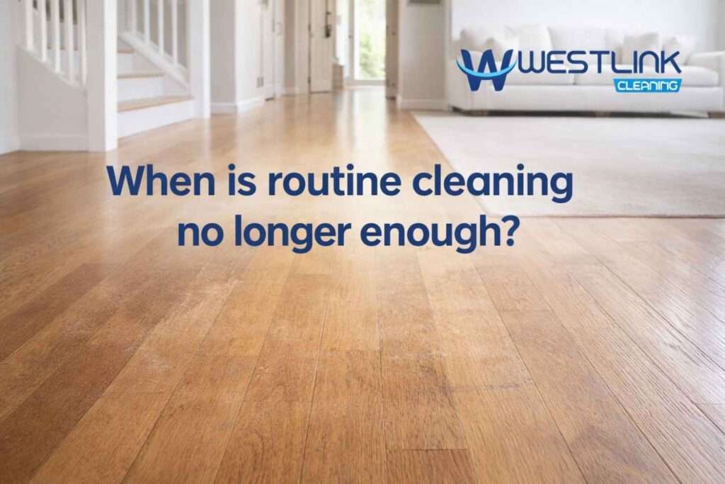 Polished timber floor with dull traffic areas and uneven finish showing limits of routine cleaning