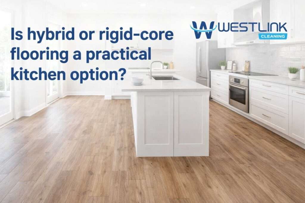 Hybrid or rigid-core kitchen flooring shown in a realistic modern kitchen with a practical timber-look finish