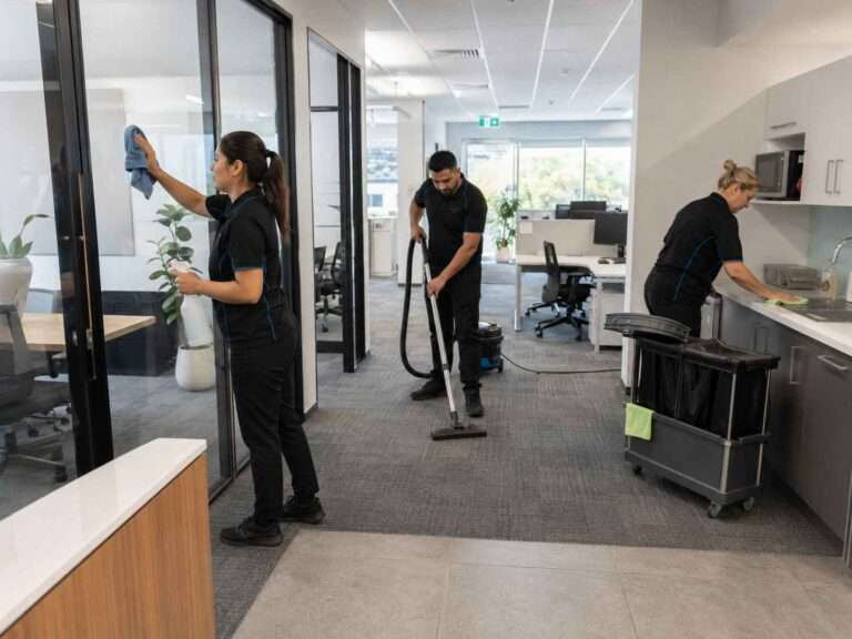Three cleaners working inside a Sutherland Shire office