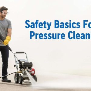 Homeowner wearing PPE safely using a pressure washer in a suburban driveway.
